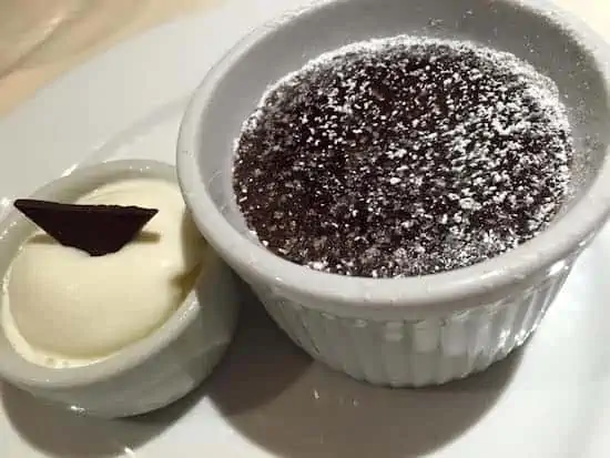 Carnival's signature Warm Chocolate Melting Cake served in the main dining room.