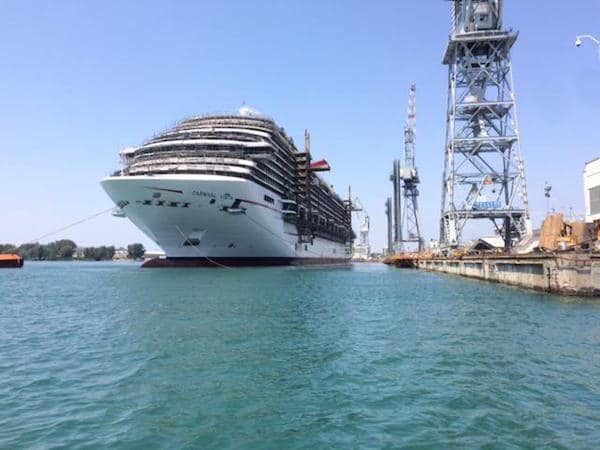 Carnival Vista leaving dry dock for wet dock. 