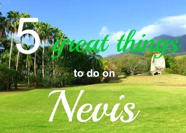 Text reads "5 great things to do on Nevis" overlaid on an outdoor scene with lush green grass, swaying palm trees, and the majestic mountain of Nevis in the background.