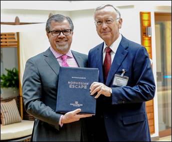 Norwegian Cruise Line Holdings Ltd. CEO Frank Del Rio (left) accepts delivery of Norwegian Escape from MEYER WERFT Managing Partner Bernard Meyer (right)