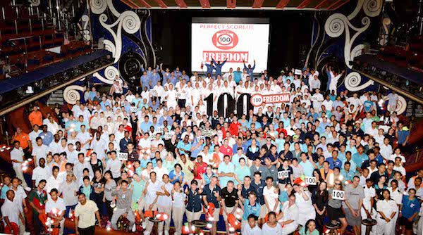 Crew and staff aboard Carnival Freedom celebration a perfect health score. photo: Carnival