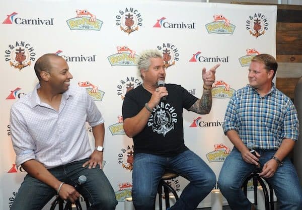 Guy Fieri, center, Malcolm Burn, left, Cruise Director at Carnival, and Eddie Allen, VP of Beverage Operations at Carnival