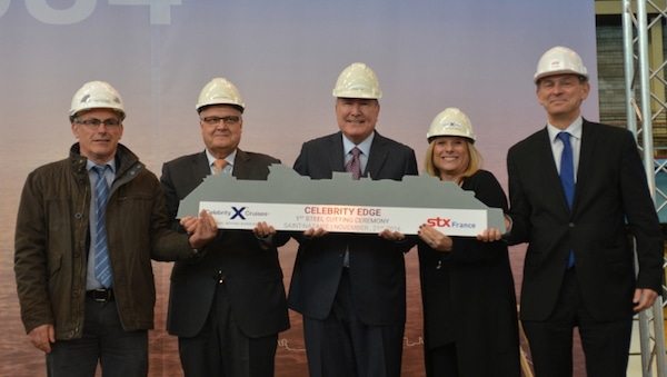 photo: Celebrity - Celebrity. President and CEO Lisa Lutoff-Perlo cuts the first piece of steel for Celebrity Edge, the first ship of its class. (left to right: Jean-Yves Jaouen, Operations Senior Vice President, Harri Kulovaara, EVP New Build and Innovation, Richard D. Fain, Chairman and CEO of Royal Caribbean Cruises, Ltd., Lisa Lutoff-Perlo, Celebrity Cruises President and CEO, Laurent Castaing, General Manager STX France)