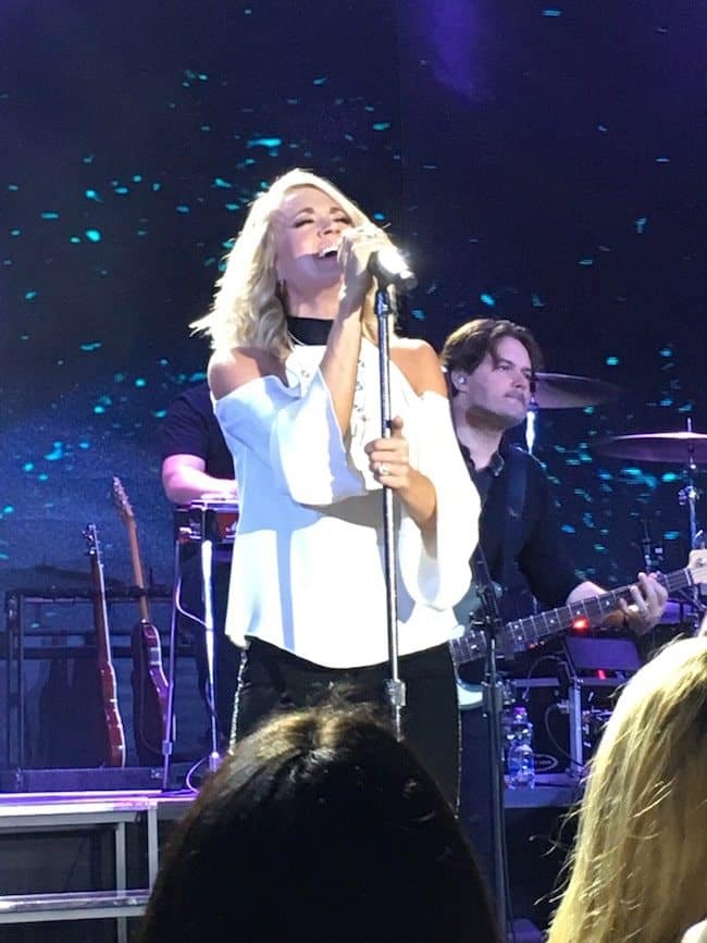 Carrie Underwood performing in the theater. 