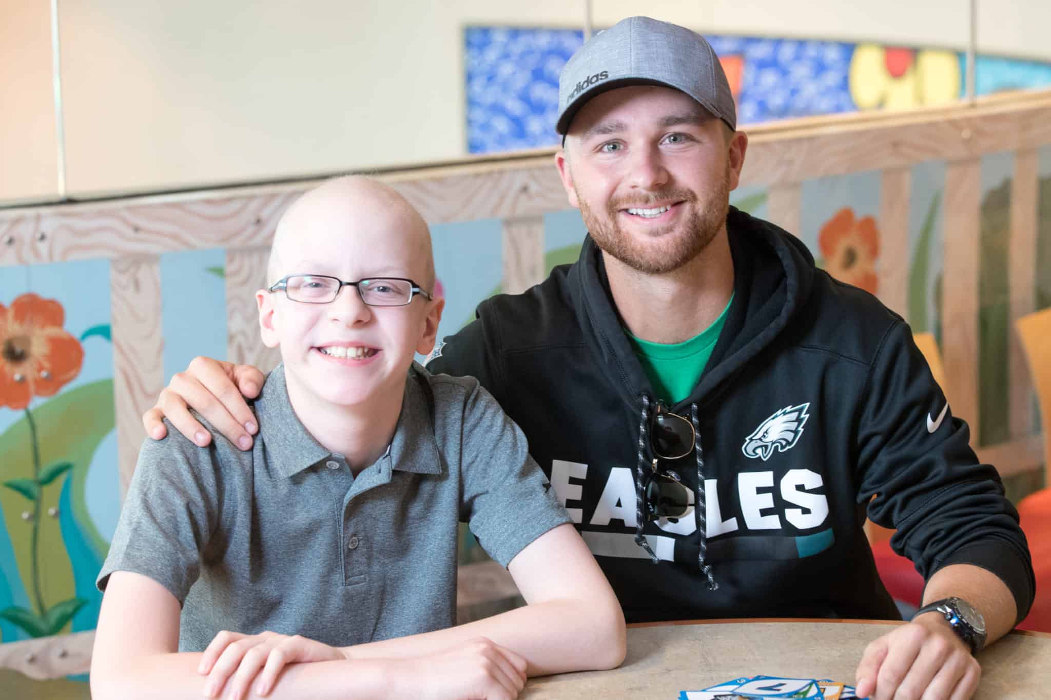 Philadelphia Eagles kicker Jake Elliot visits with St. Jude patient Zac