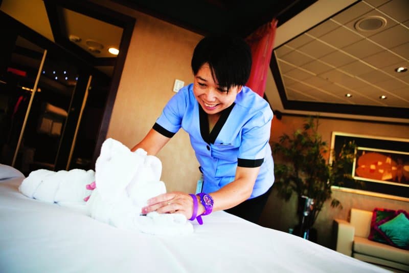 cabin steward cleaning the stateroom