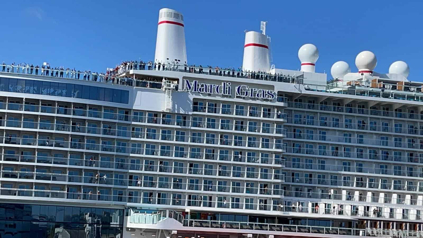 carnival cruise mardi gras crew waving