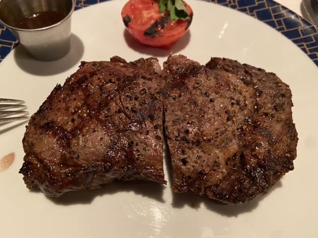 cagney's ribeye cut in half