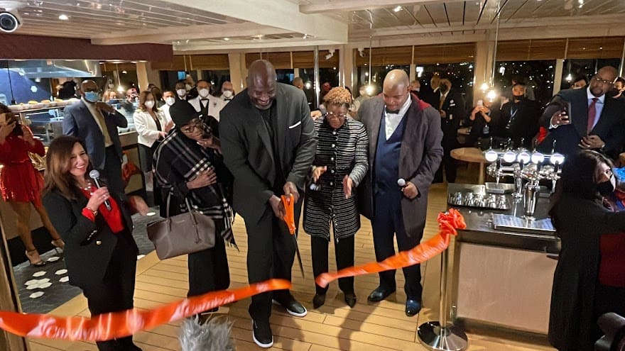 Shaq's family ribbong cutting