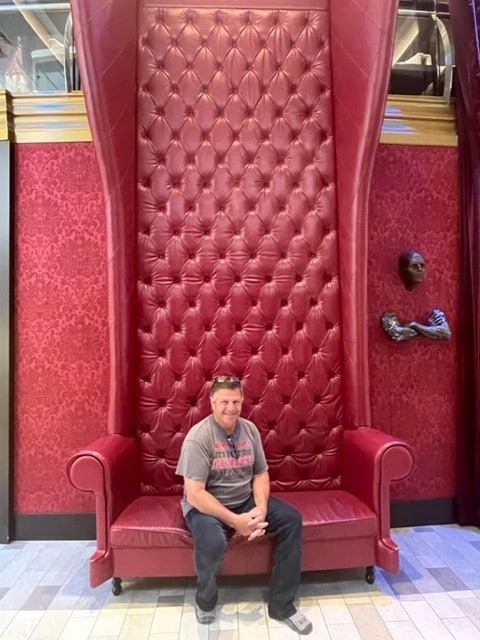 gordon in a red chair