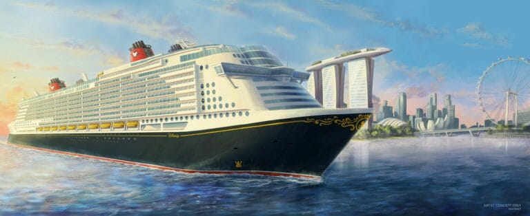 A large Disney Cruise Line ship sails in the foreground with a cityscape featuring the Marina Bay Sands hotel and a Ferris wheel in the background under a clear sky.