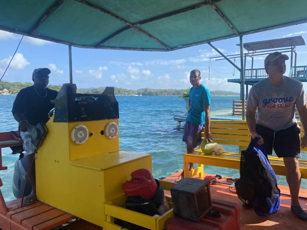 Roatan Honduras on a small French keyboard boat