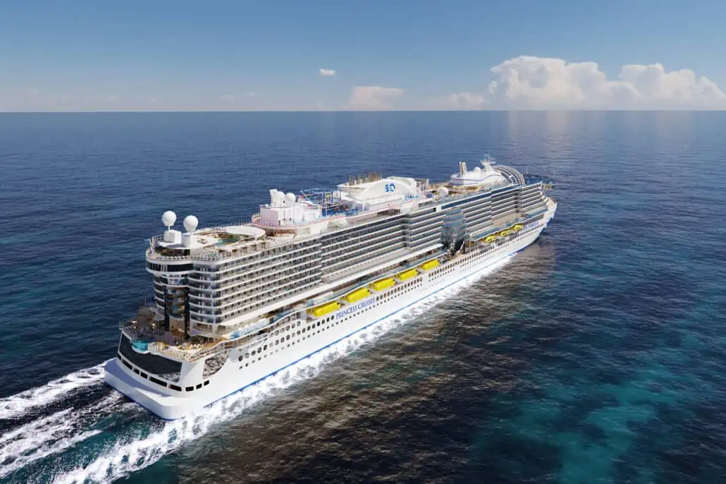 A large Princess Cruises ship sails through calm, blue ocean water under a partly cloudy sky. The cruise ship has multiple decks with various amenities catering to the family market, and its white exterior features some yellow lifeboats visible along the side.