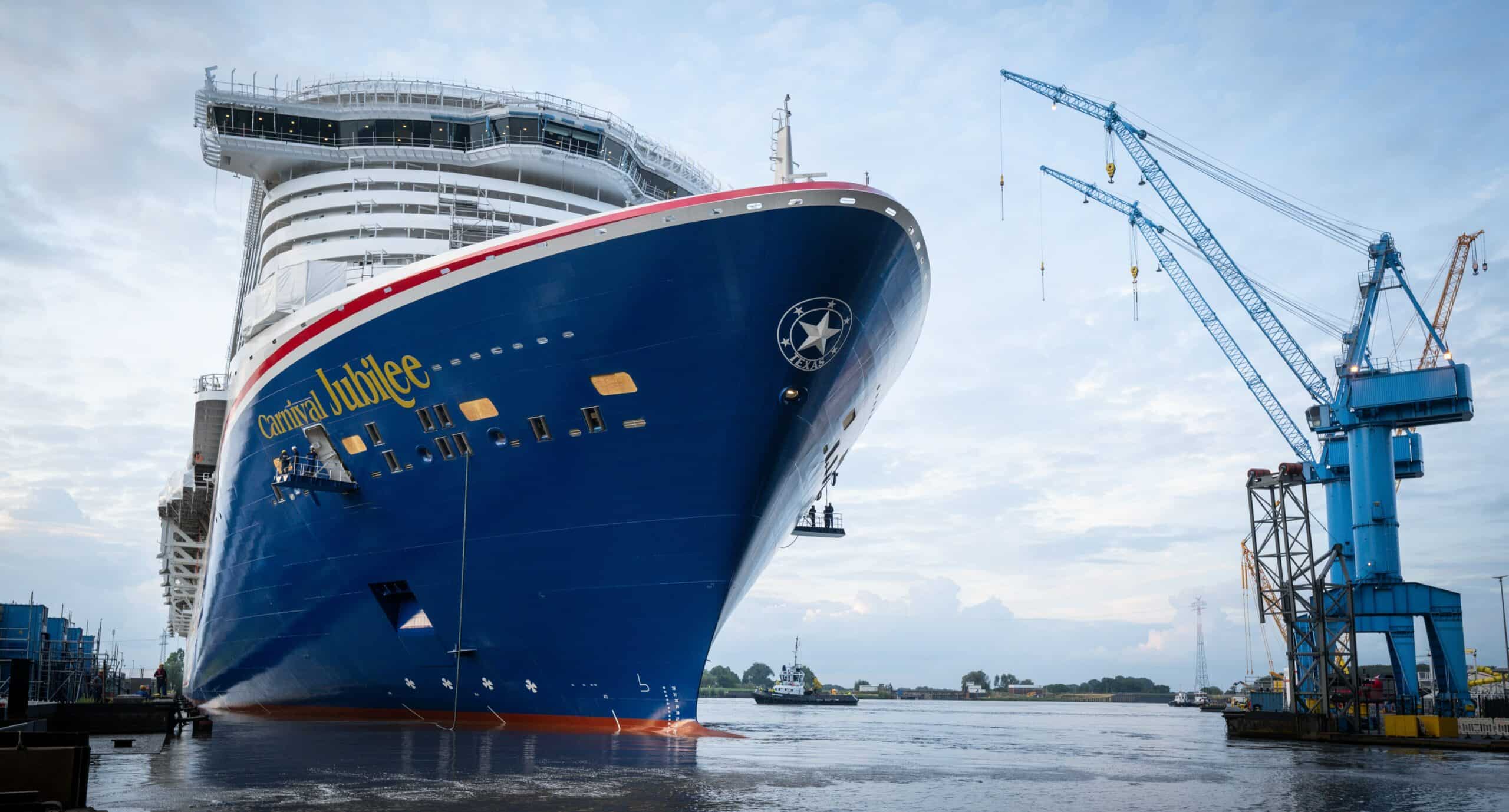 Carnival Jubilee moves into its next phase of construction alongside the shipyards outfitting pier scaled