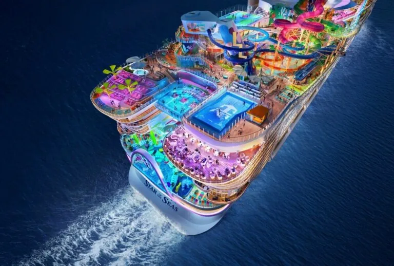 An aerial view of a cruise ship in the ocean on its Inaugural Sailing.