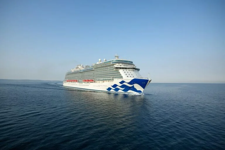 A Love Boat themed cruise ship sailing in the ocean.