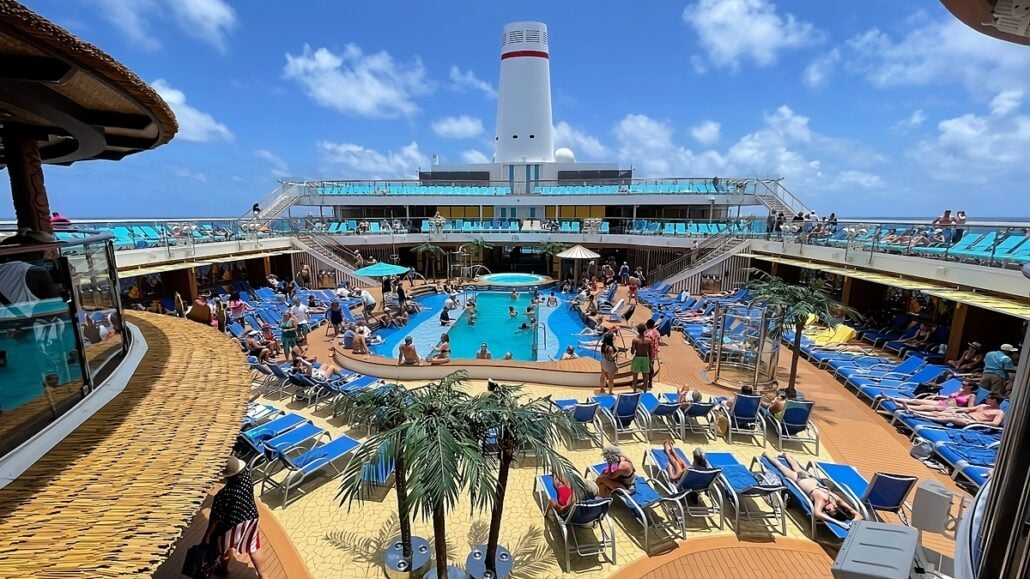 A view of the pool deck on a cruise ship.