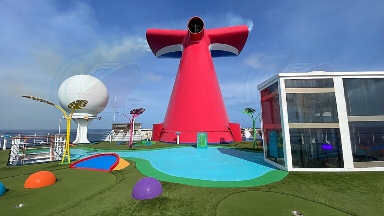 A cruise ship has a large playground with a red ball pit.