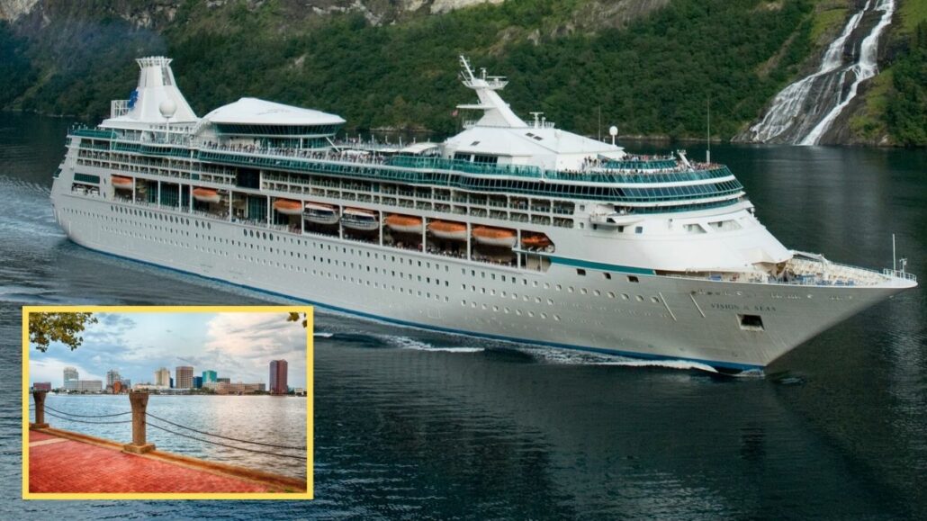 A large white cruise ship named "Vision of the Seas" sails through a green, mountainous landscape with a waterfall in the background. An inset in the lower left corner shows a red brick waterfront area with a city skyline in the distance, highlighting the journey of Vision of the Seas.