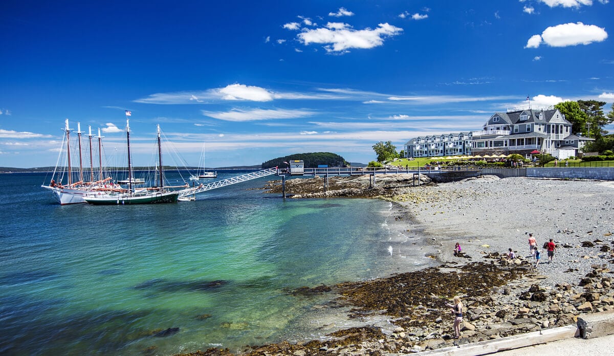 Coastal scene with a sailboat docked at Bar Harbor
