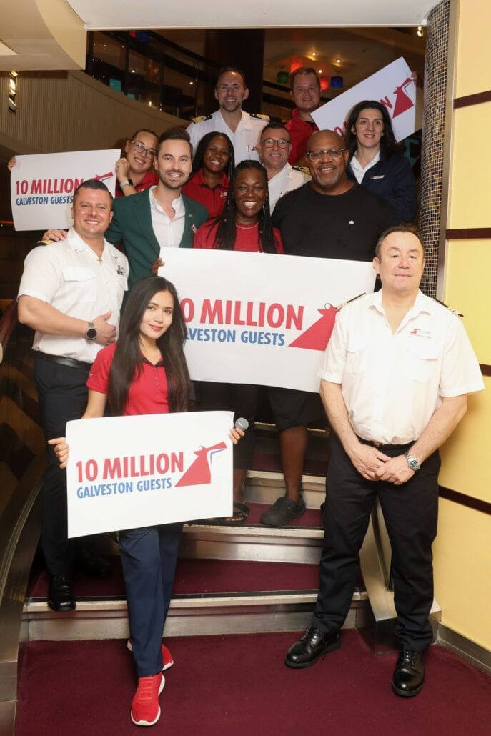 Marsha Taulton Carnivals 10 millionth guest from Galveston and husband Paul Taulton celebrate with Carnival Breeze team