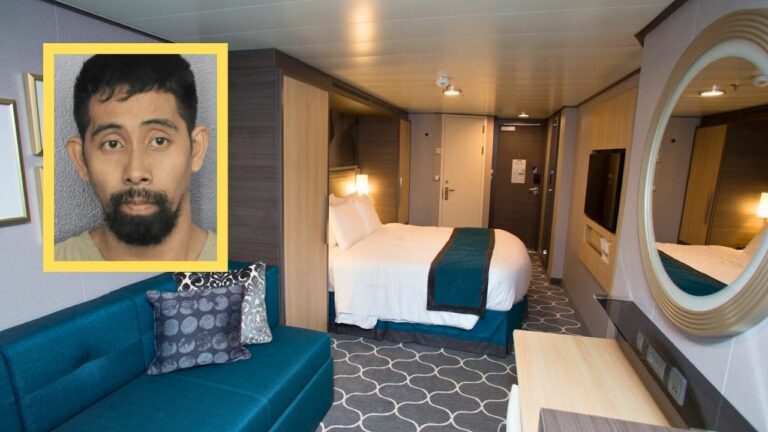 A Royal Caribbean cruise ship cabin featuring a double bed, a blue sofa with patterned pillows, a round mirror, and a TV. The decor showcases a grey and blue color scheme. In the corner, there's an inset image of an unidentified crew member.