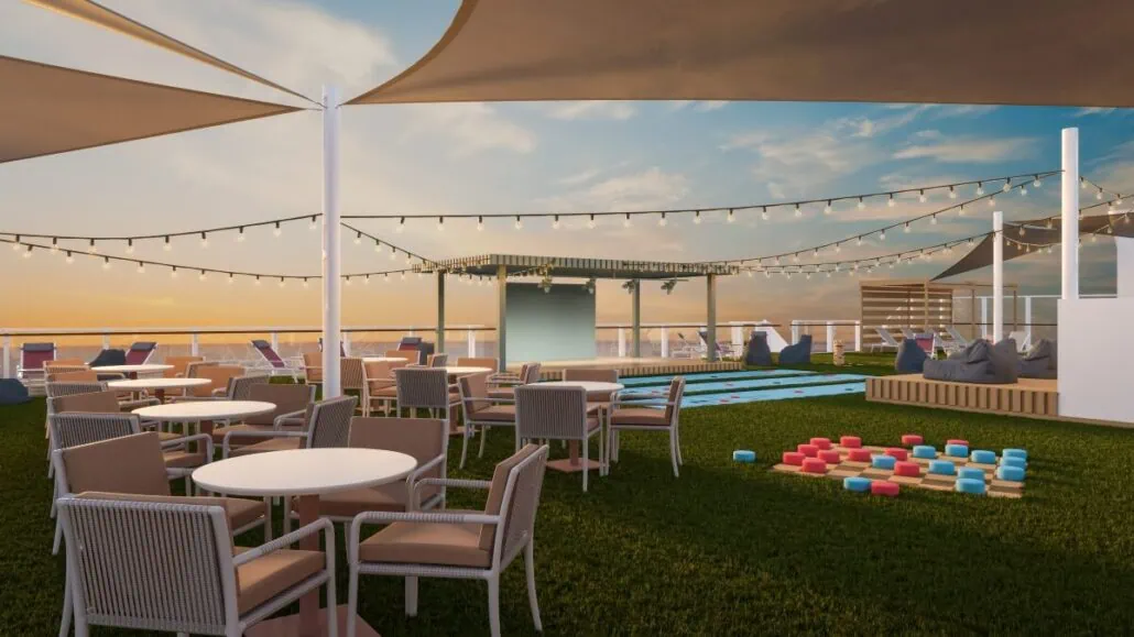 A rooftop lounge at sunset offers an upgraded dining experience with outdoor seating, a swimming pool, and a play area with large colorful blocks. String lights glimmer overhead as the sky remains partly cloudy, setting the perfect scene for an elegant entertainment venue.