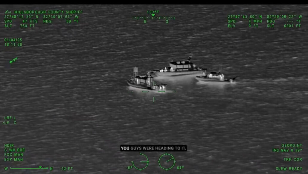 An infrared image reveals three boats on the water, two smaller vessels flanking a larger cruise ship in the center. Text overlay reads, "You guys were heading to it." Green autopilot indicators are visible at the edges.