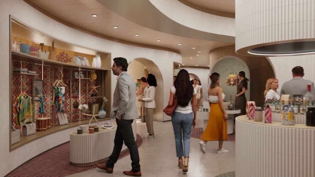 Shoppers at The Bazaar browse a modern retail space with curved wooden shelves showcasing colorful items. The store features a neutral palette, circular design elements, and a polished floor, offering an inviting atmosphere for casually dressed visitors.