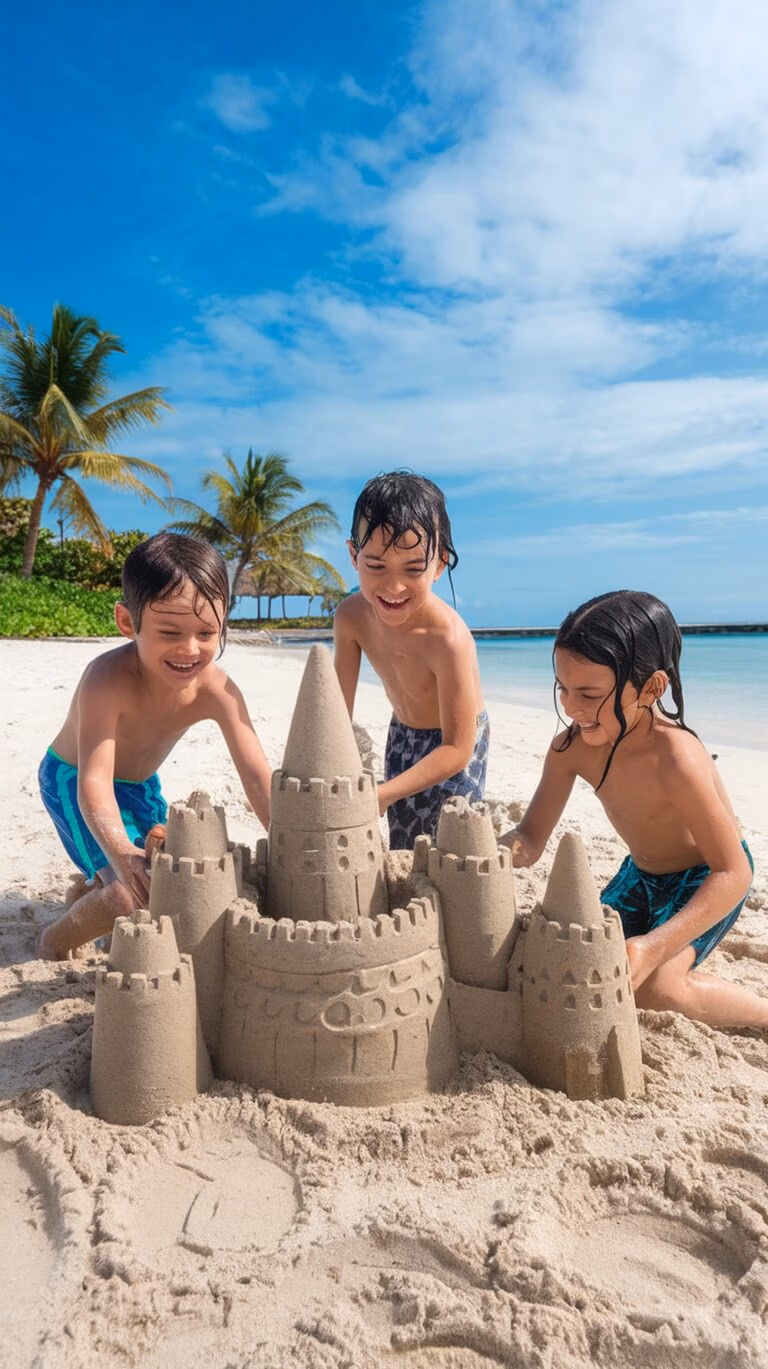 Three children are on an unforgettable adventure, building a large sandcastle with multiple towers on a sandy beach. The ocean and palm trees form a stunning backdrop under a partly cloudy sky. Clad in swim trunks, the youngsters revel in their Caribbean paradise escapade.