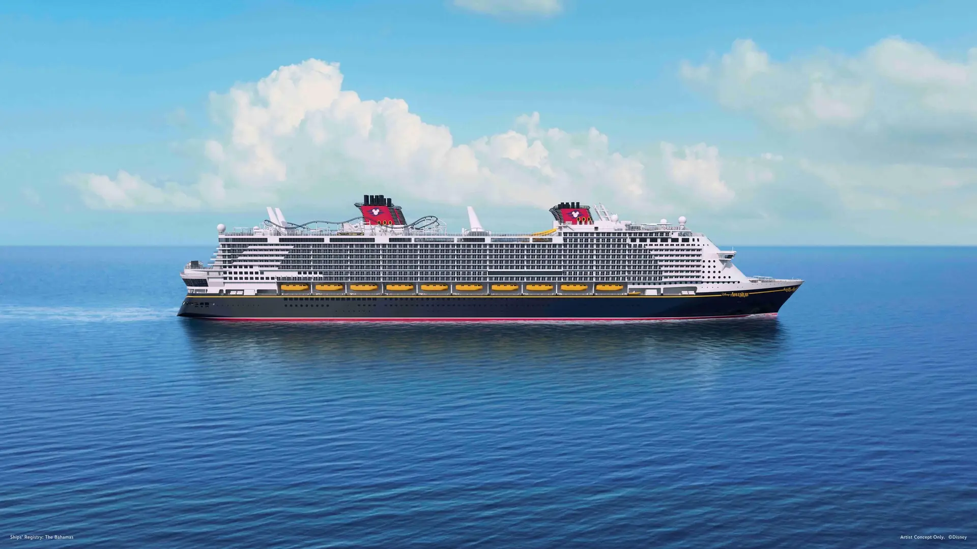 A large Disney Cruise Line mega ship with two red funnels and multiple decks sails on calm blue water under a partly cloudy sky. The ship features yellow lifeboats along the sides and is shown in profile.