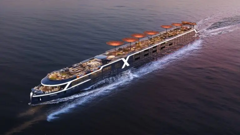A modern Celebrity River Cruise ship sails on calm water at sunset, featuring multiple open-air decks with seating, large sun umbrellas, and illuminated railings—showcasing the next wave of river cruise expansion.