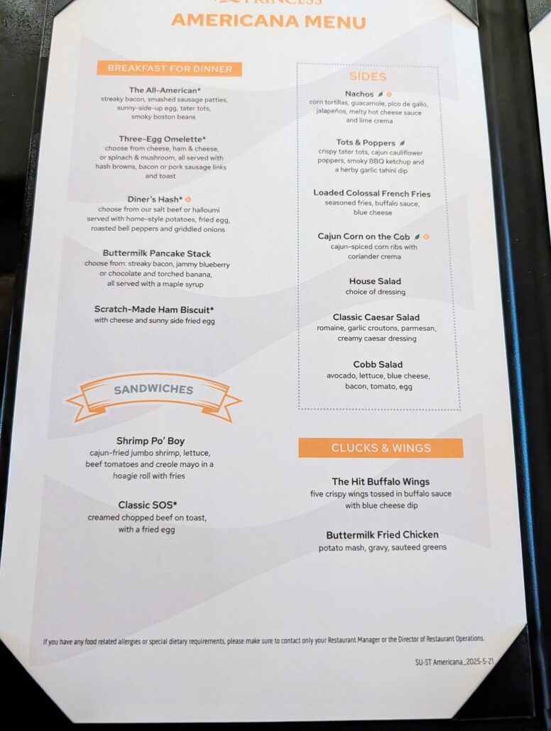 A restaurant menu titled "Americana Menu" on Star Princess features dining options like breakfast for dinner, sandwiches, sides, and clucks & wings, each with a variety of food items and descriptions listed under every section.