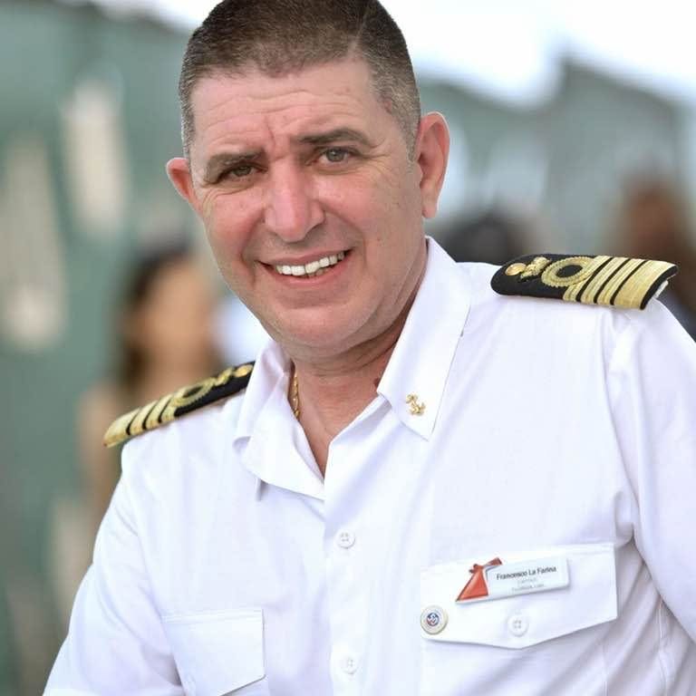 Carnival Cruise Line Captain Francesco La Farina in uniform aboard a Carnival ship.
